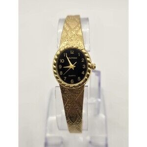 Waltham Ladies' Gold Tone 17.5mm Black Dial Watch. W062- 007. 6.75" Band.